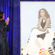 Former first lady Michelle Obama looks at her newly unveiled portrait during a ceremony at the Smithsonian’s National Portrait Gallery on Feb. 12, 2018, in Washington, D.C. (Mark Wilson/Getty Images)